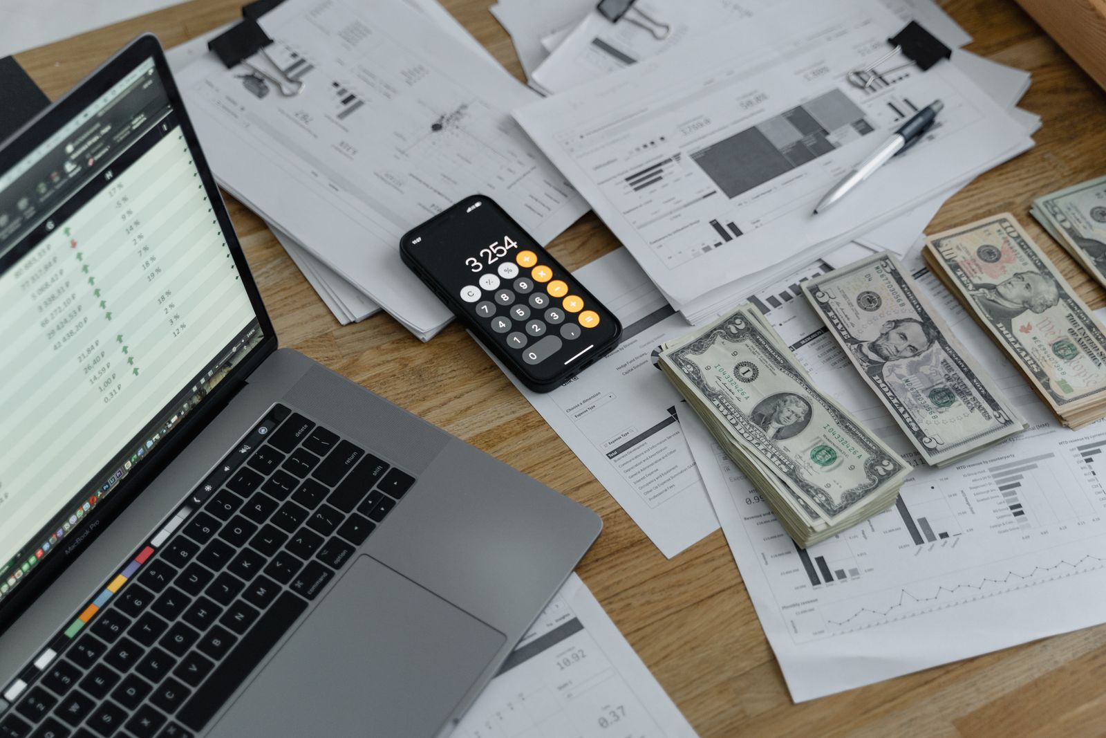 Organized invoices and bill payment management on a laptop